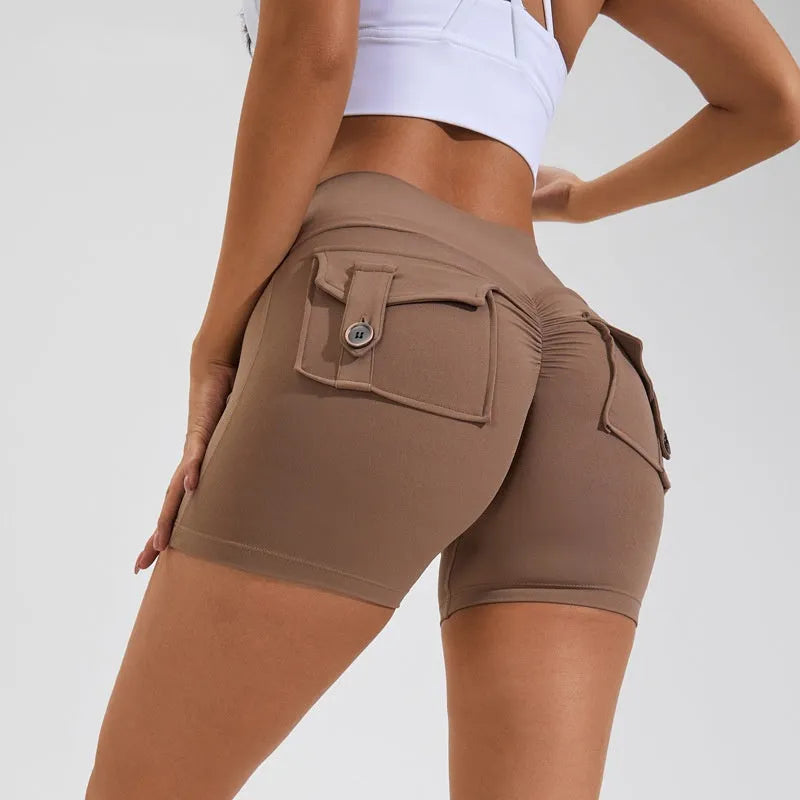 Women's high-waisted fitness shorts with pockets in various solid colours