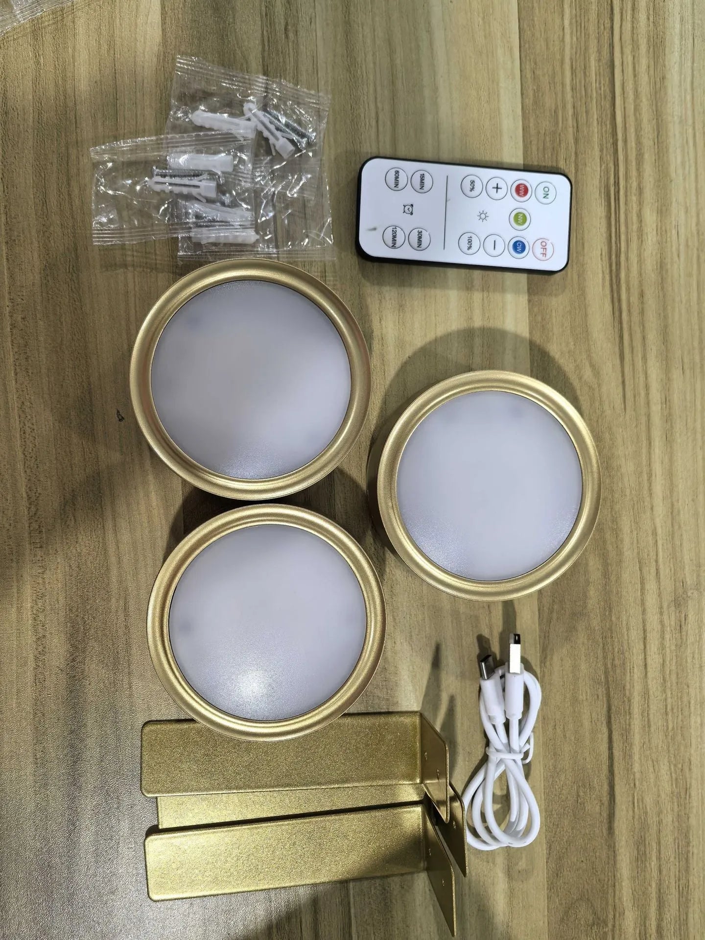 Wireless LED painting lamp with magnetic charging and remote control in black, white or gold finish