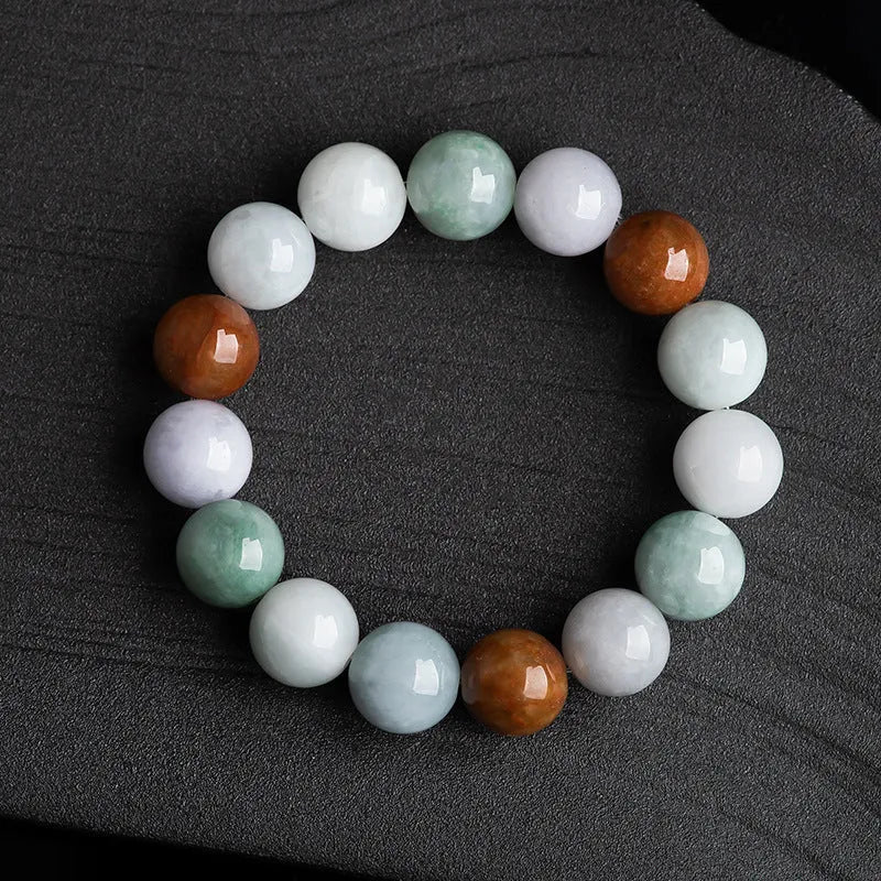 Women's Myanmar jade bracelet showing three-colour pattern on 13mm round beads.