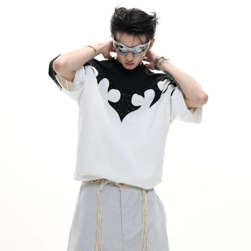 Men's grey cotton T-shirt with burnt flower stitching and rhinestone decoration showing loose fit drop shoulder design