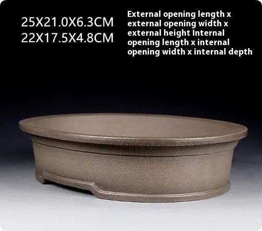 Handmade antique oval bonsai flower pot in purple sand ceramic showing 25X21X6.3CM dimensions