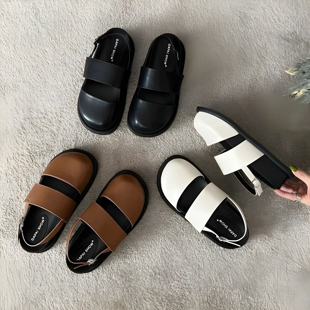 Retro sandals with closed toe design and adjustable ankle-strap buckle in apricot colour