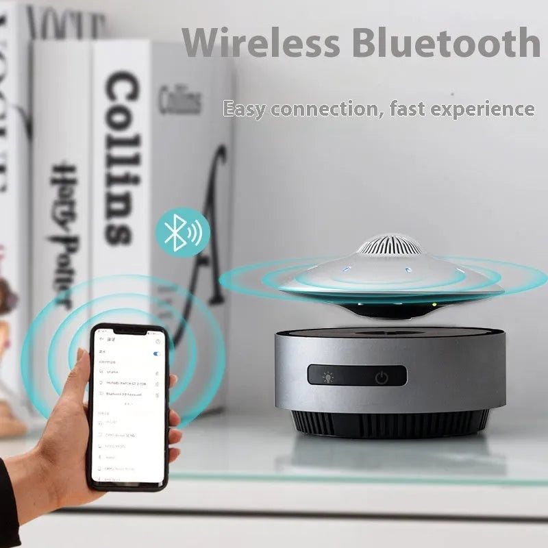 Automatic lifting magnetic levitation Bluetooth speaker with floating mid-section and ABS housing