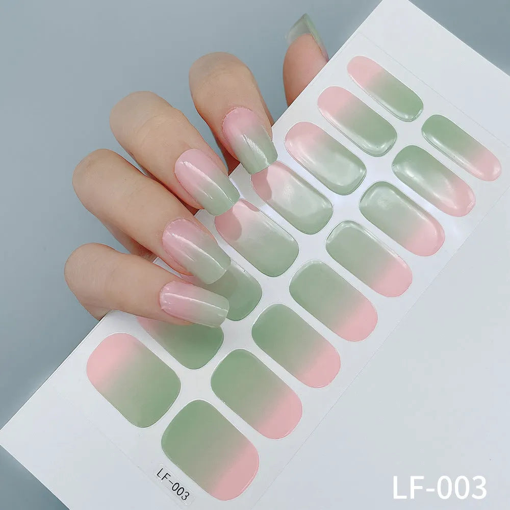 Sheet of 16 solid colour nail art sticker designs including cross, rose, and leopard print patterns.