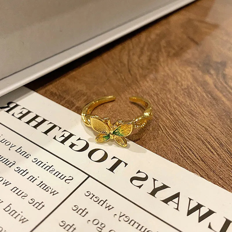Copper women's ring featuring a creative Chinese butterfly design, available in multiple colours.