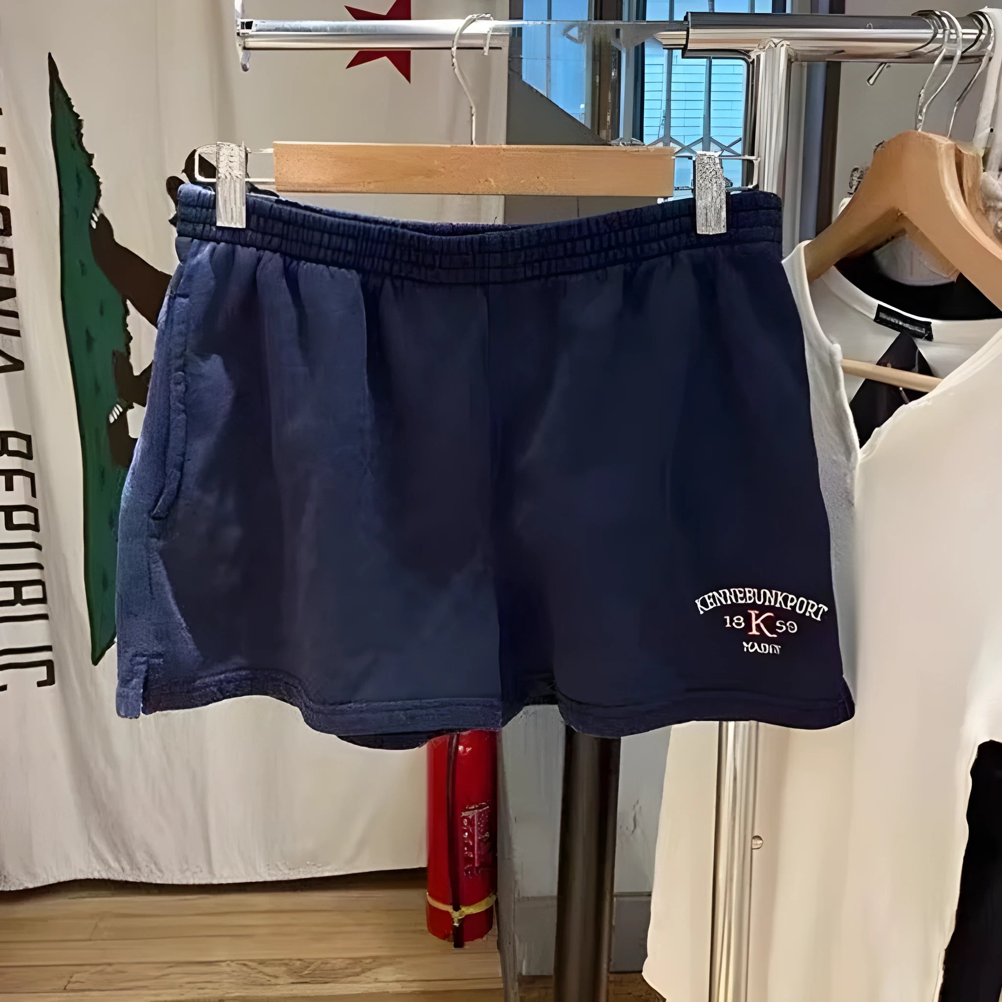 Women's dark blue cotton sports shorts with embroidered white flag design and free size fitting