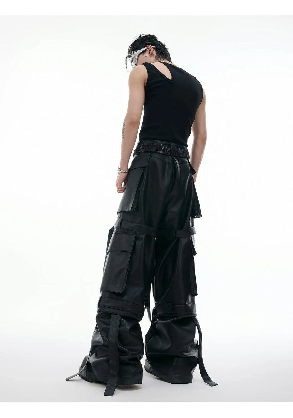 Black loose fit leather-look pants with quilted multi-pocket design showing front and back views