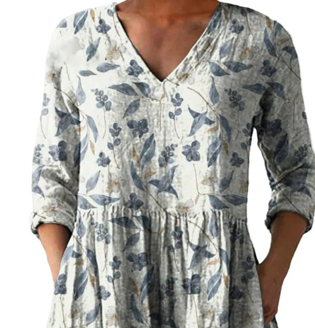 Women's printed floral dress with loose fit, wide waist, and 3/4 ruffle sleeves