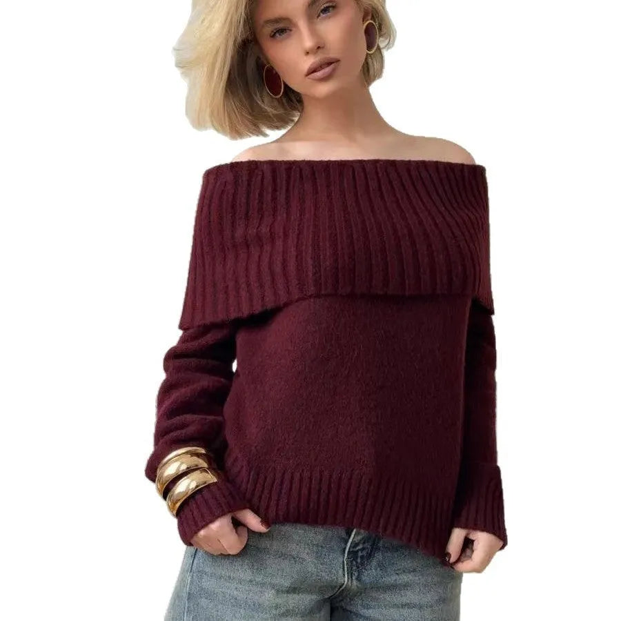 Grey off-the-shoulder sweater with a 3D pattern and strapless design, laid flat.
