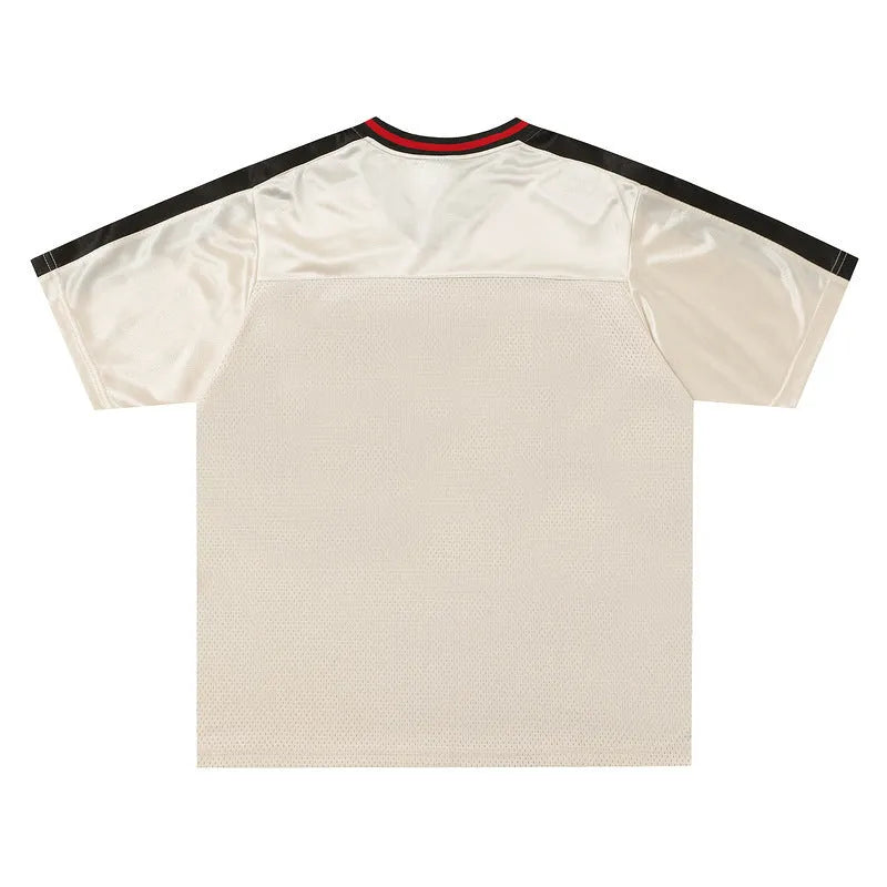 Apricot sports V-neck jersey top with drop-shoulder sleeves and letter pattern design