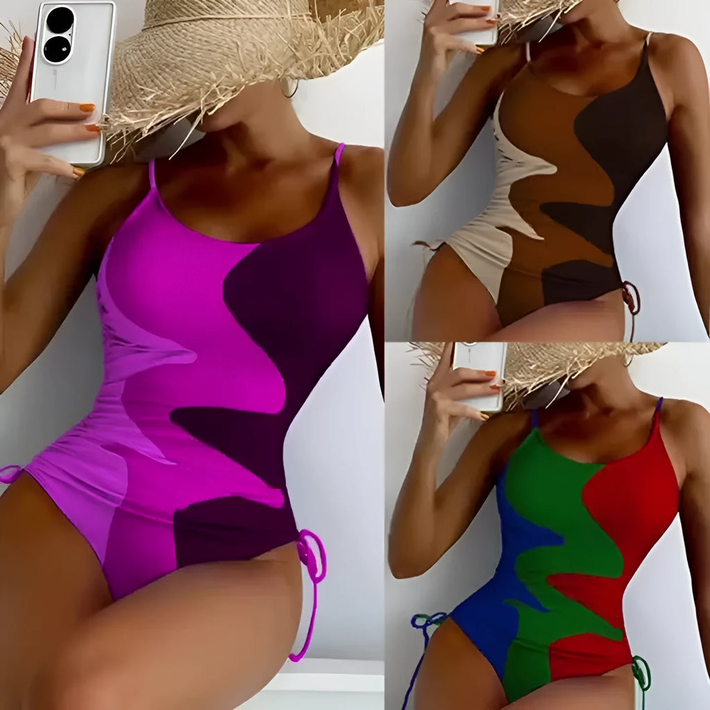 Women's sleeveless backless one-piece swimsuit in blue, shown on a mannequin.