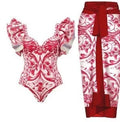 Women's one-piece polyester swimsuit in printed rose pink or blue with optional skirt design