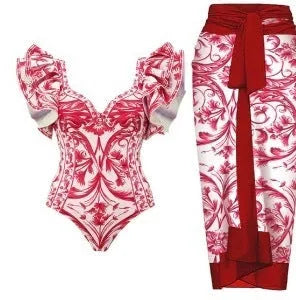 Women's one-piece polyester swimsuit in printed rose pink or blue with optional skirt design