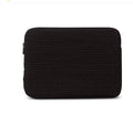 Black and white hand-held anti-seismic cotton laptop clutch bag for tablets, showing coin pocket.