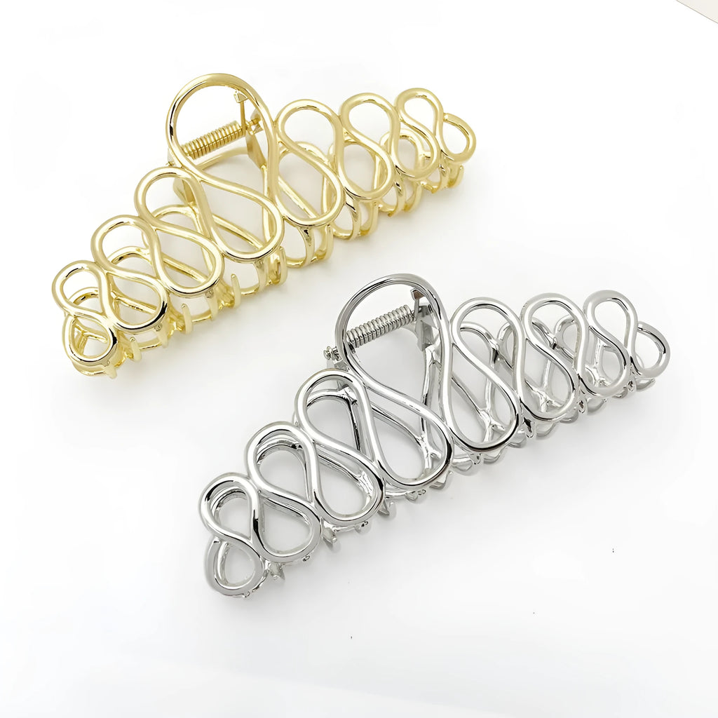 Large alloy hair clip with tassel design in gold electroplated finish for women's updo styling