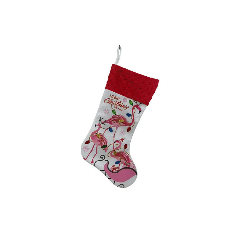 Flamingo Christmas stocking holiday decoration in cloth material measuring 46cm by 28cm