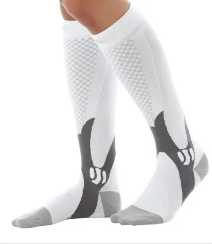 Athletic fit graduated compression socks for men and women in black, shown on a leg.