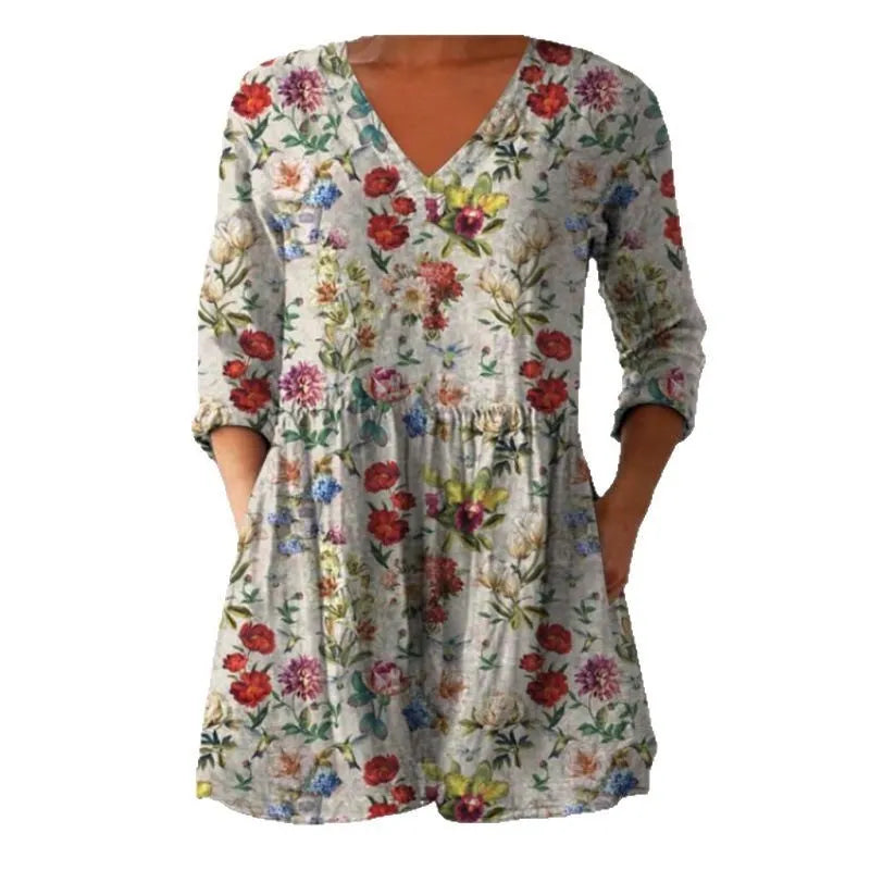Women's printed floral dress with loose fit, wide waist, and 3/4 ruffle sleeves