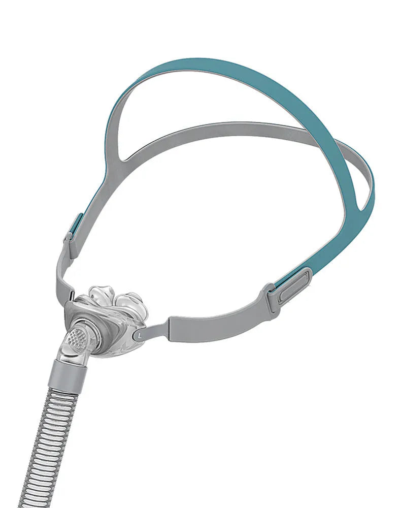 Nasal pillow ventilator mask with silicone cushion and adjustable headband for CPAP therapy