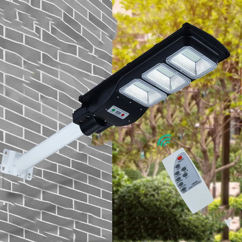 60W integrated solar street light with remote control for outdoor garden and rural pathway illumination.