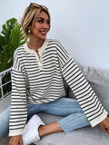 Black striped women's loose top with drop-shoulder sleeves and button detail
