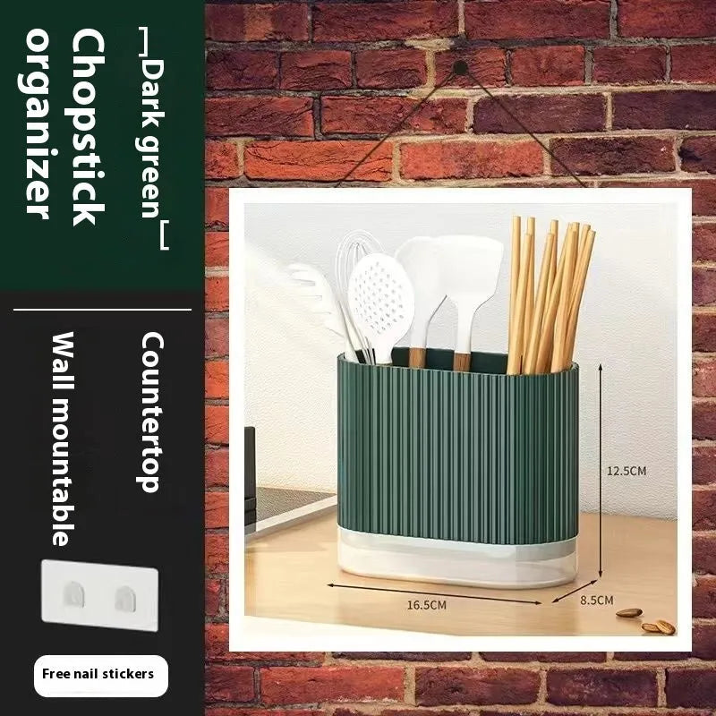Plastic wall-mounted chopstick and spoon holder tube with drainage holes in beige colour.