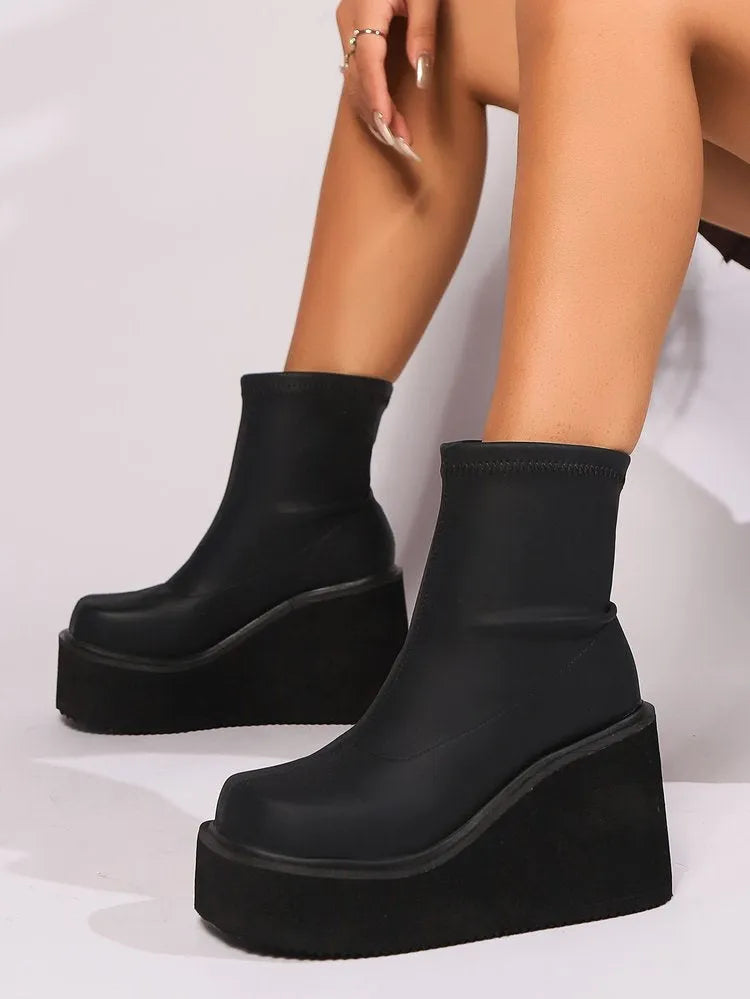 Plus size women's black wedge heel boots with round toe and waterproof platform sole