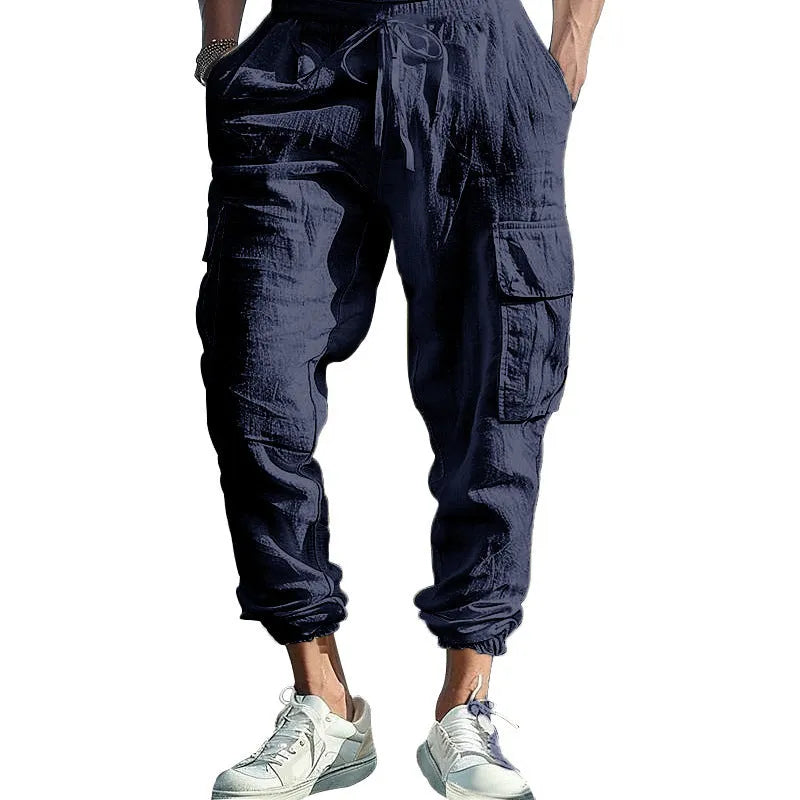 Men's linen casual trousers with drawstring waist and ankle-tied cuffs in solid colours
