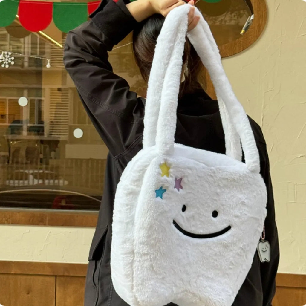 White plush shoulder tote bag with cute teeth pattern and front zip closure