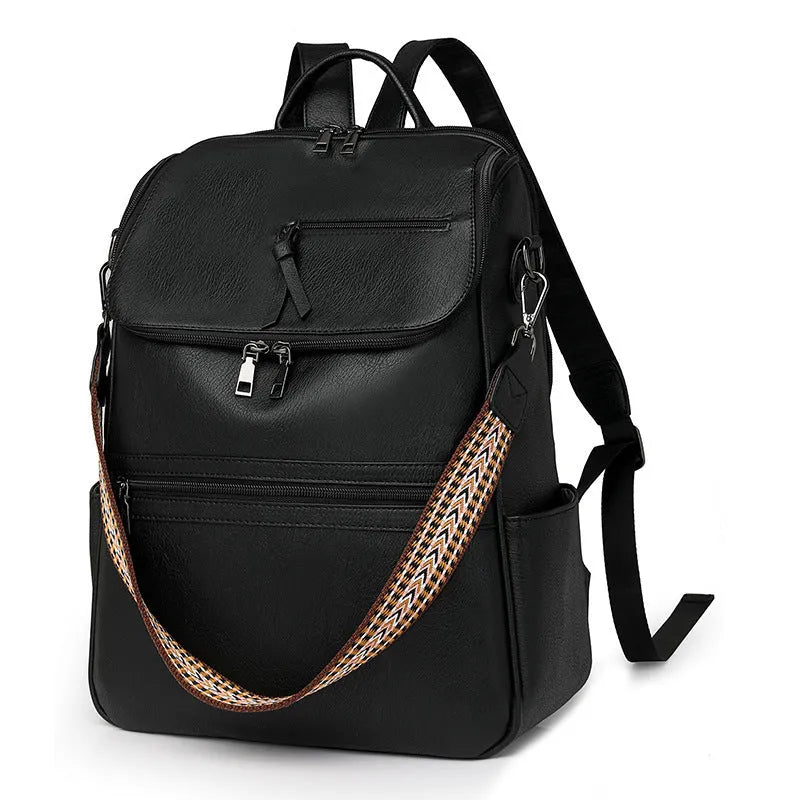 Retro college backpack in PU material with a curved shoulder strap shown in multiple colour options.
