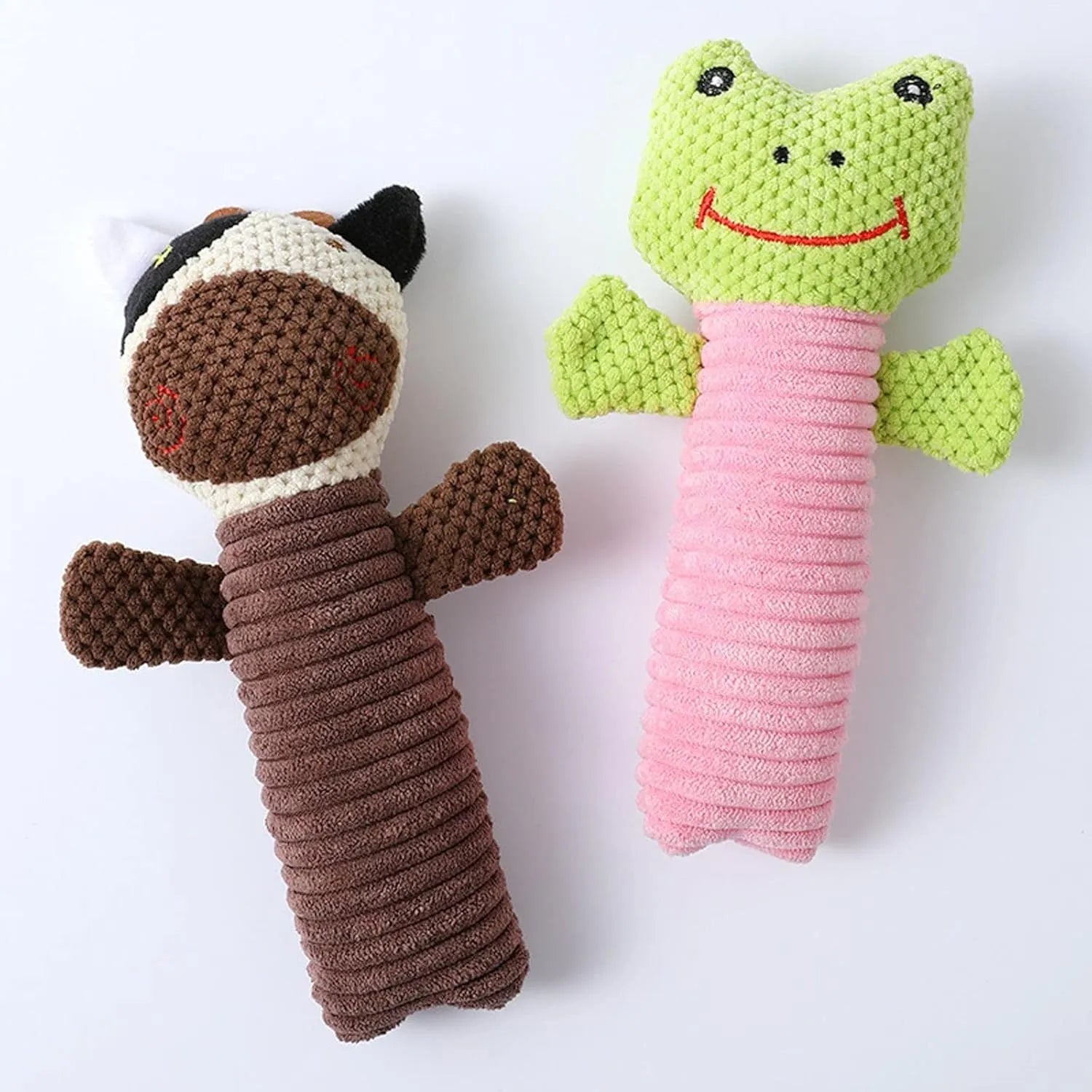 Soft plush dog chew toy in animal shape with squeaker, shown with size scale.