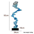 Minimalist abstract resin decorative sculpture in bright gold, silver, or blue.