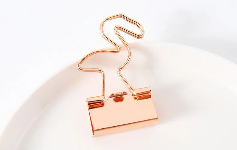 Gold-plated long tail metal paper clip showing decorative flamingo, love, clouds, cat, cactus, and bow design options.
