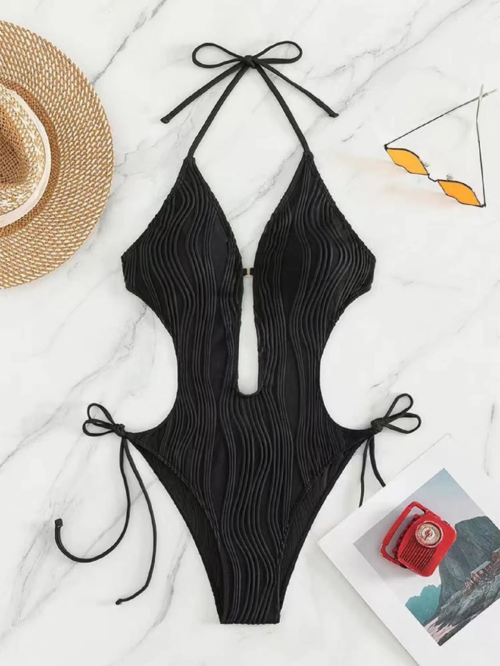 Women's black triangle bikini swimsuit with front lace-up closure