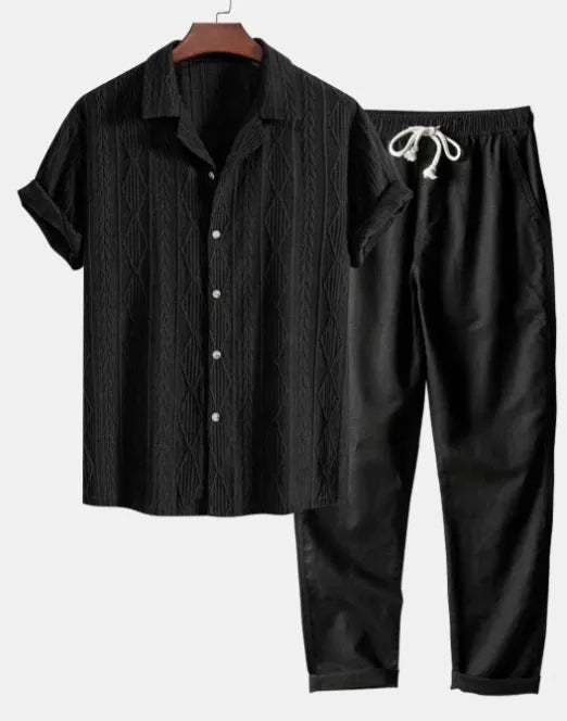 Men's casual camouflage print cardigan suit with short sleeve shirt and trousers on a hanger.