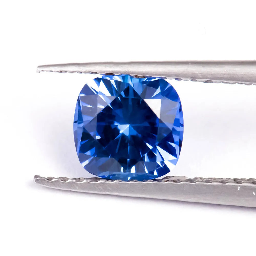 Royal blue synthetic gemstone showing heart, round, and pear cut shapes for jewellery making