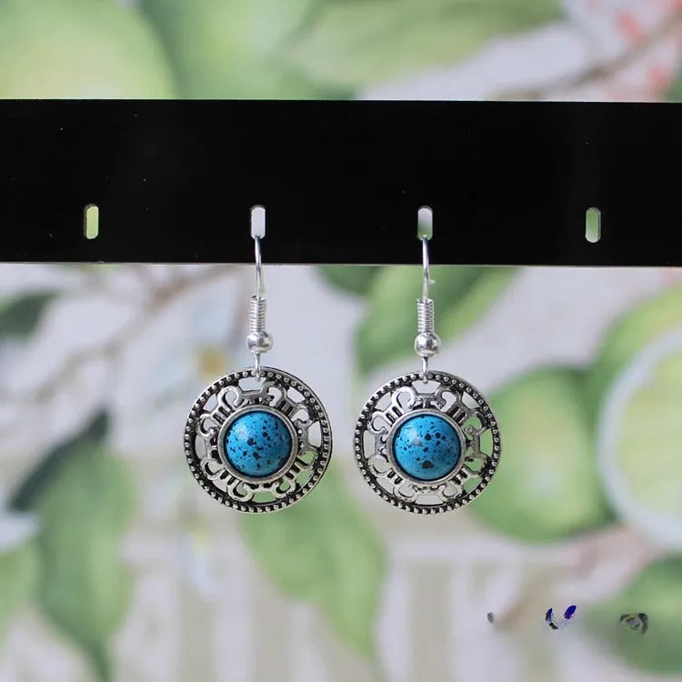Miao silver retro turquoise flower disk earrings with geometric shape and ethnic patterns
