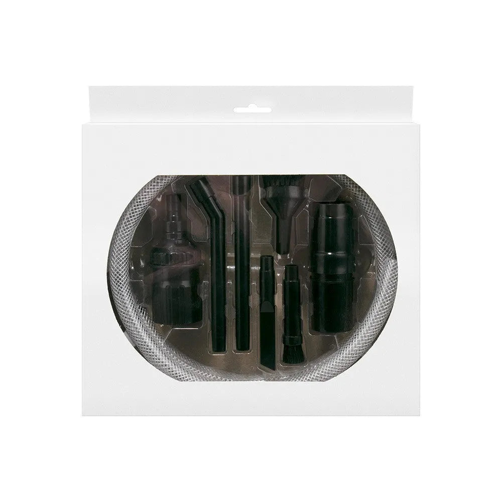 Eight-piece vacuum cleaner attachment set with various suction heads including floor brush and upholstery tool