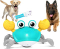 Blue or red electronic crawling crab dog toy with sensors, lights, on floor.