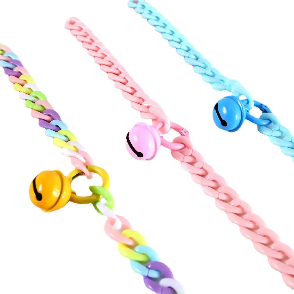 Macaron candy coloured plastic pet collar for cats, dogs, and rabbits in chain blue, pink, and mixed colours on a white background.