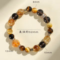 Handmade yellow artificial crystal bead bracelet with 10mm Jinba style beads and adjustable string closure