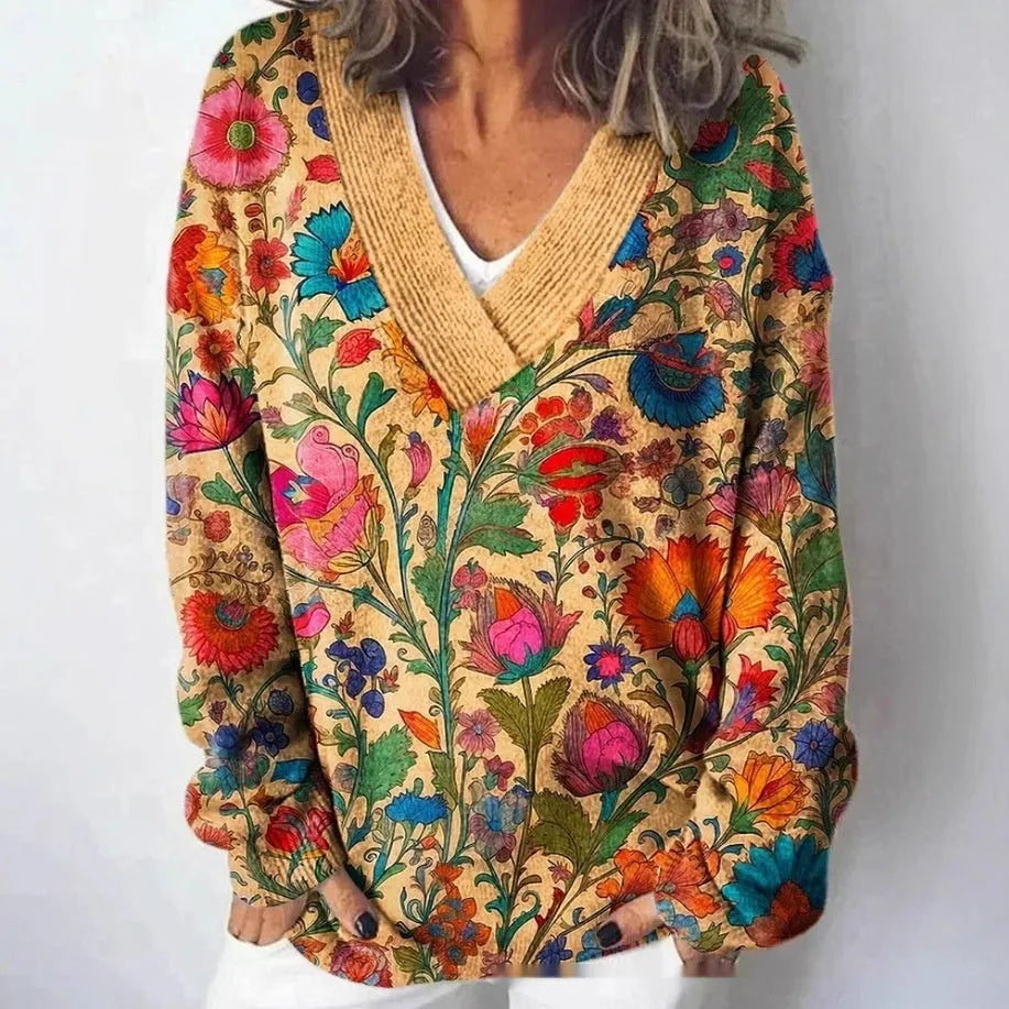 Women's V-neck floral print sweatshirt with long sleeves in wool woven fabric.