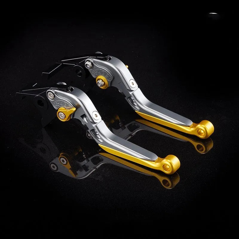Pair of anodised metal motorcycle brake and clutch levers with adjustable length mechanism