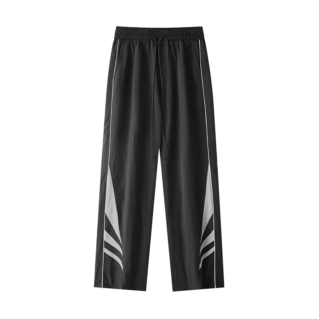 Men's straight cut casual trousers in black with elastic waistband and cardigan button detail