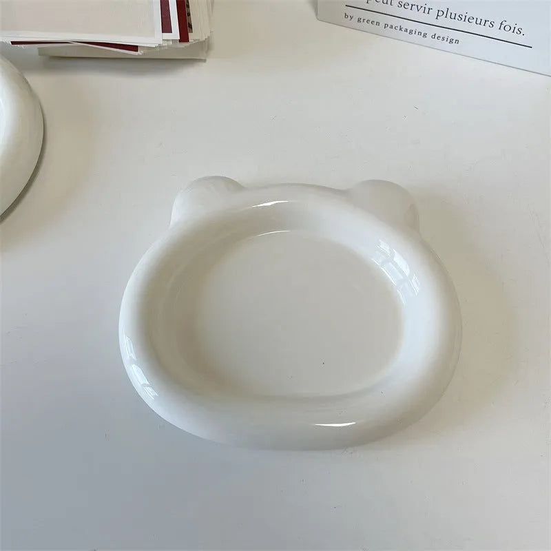 White porcelain plate with bear decoration or plain round shape, shown in 15cm and 20cm sizes.