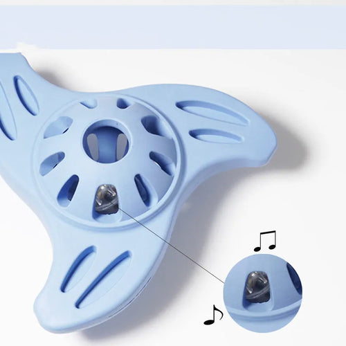 Blue boomerang-shaped dog chew toy with textured edges for medium and large breed dogs