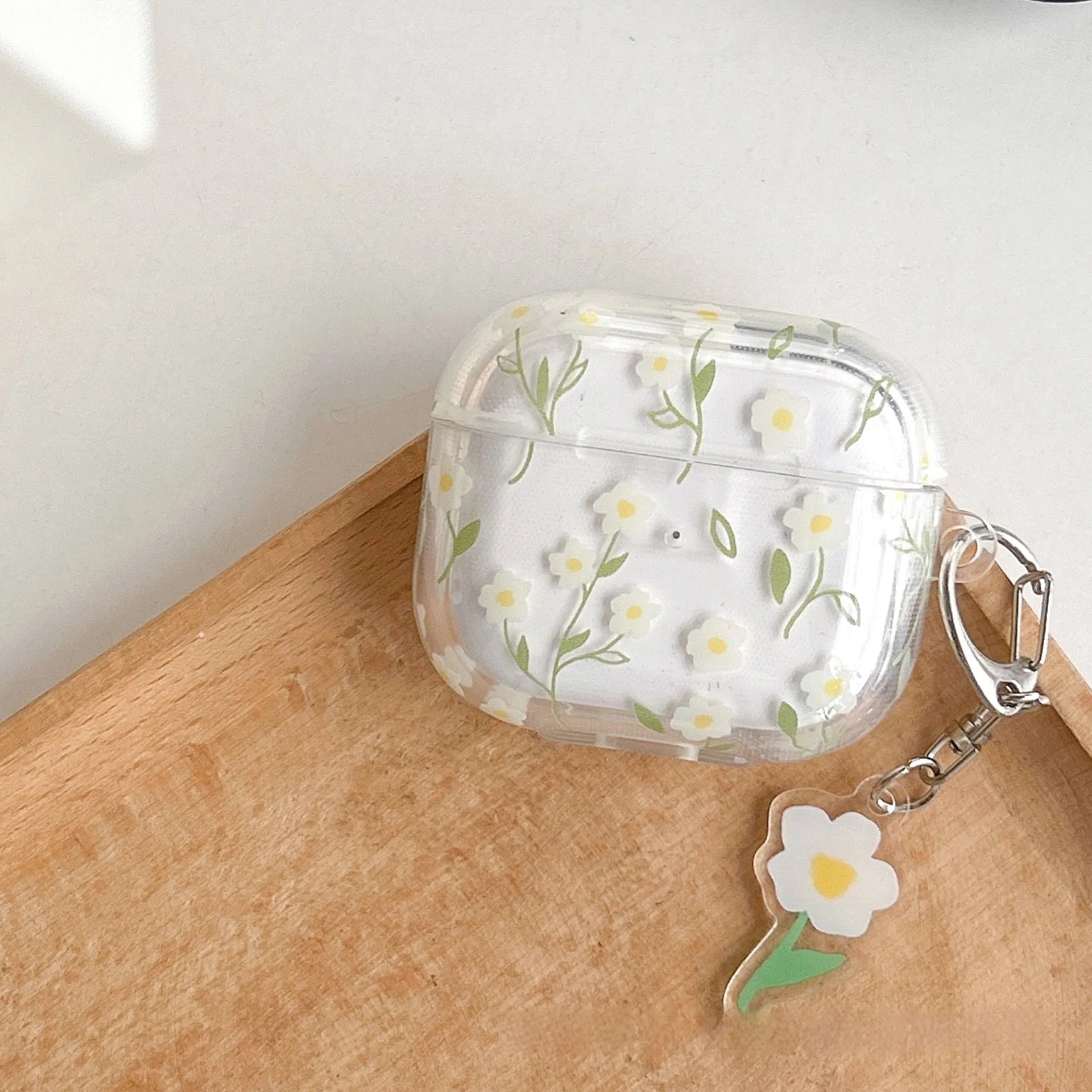 White floral pattern TPU protective case for Apple AirPods on transparent background