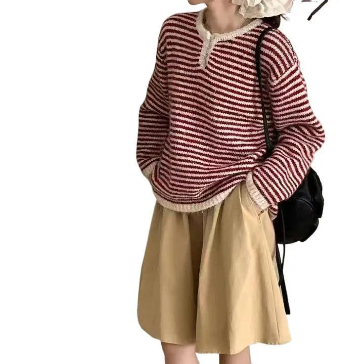 Red and blue striped cashmere pullover sweater for women with loose fit and long sleeves.