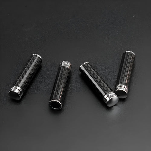 Carbon fibre door lift decorative cover set showing four units for vehicle installation