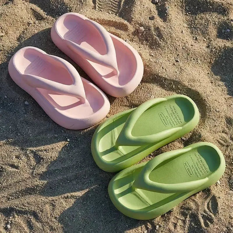 Solid colour EVA thong sandals with thick sole and a bow on the strap.